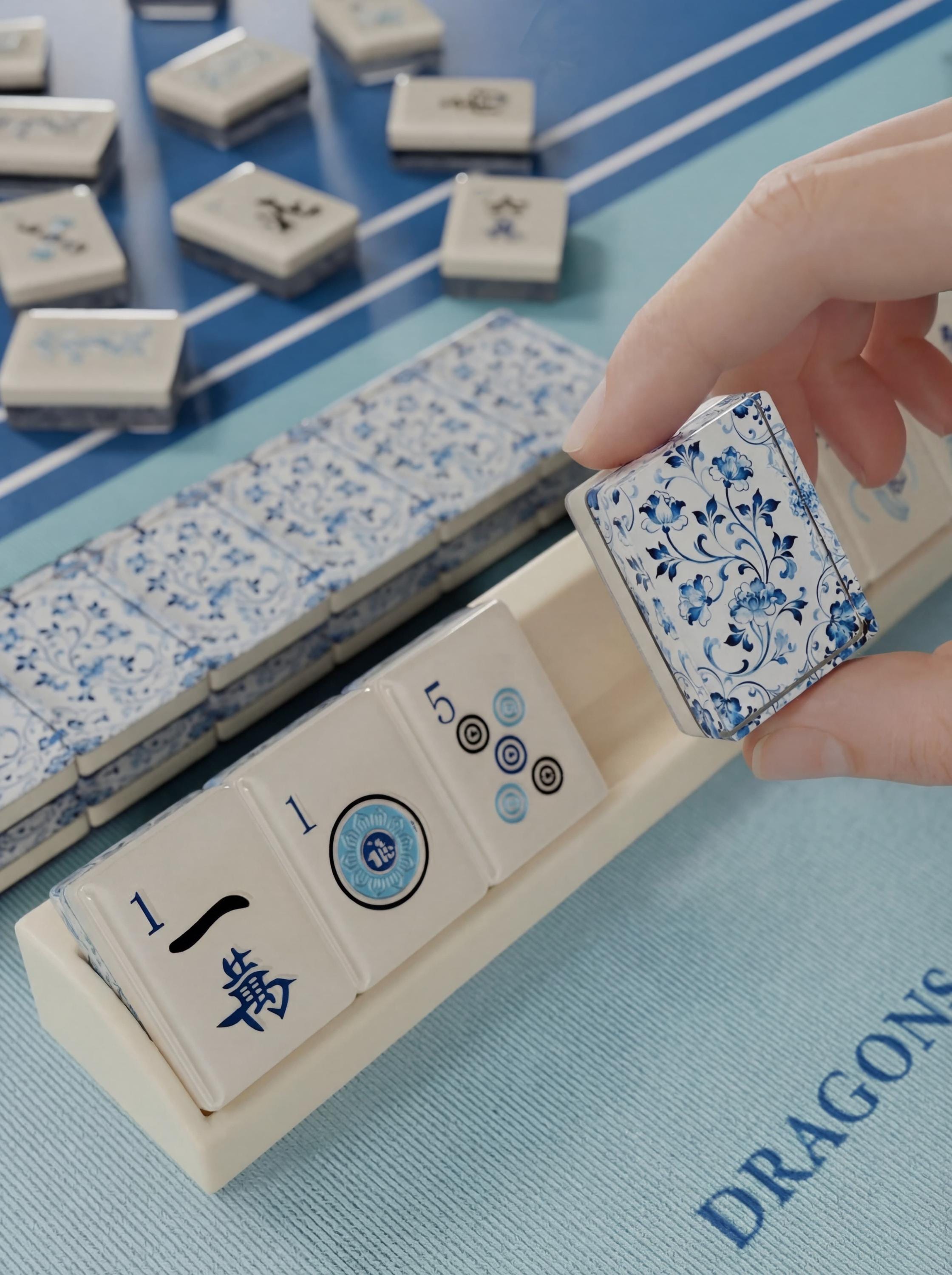 Blue Porcelain Floral handcrafted resin mahjong tiles being used at the table