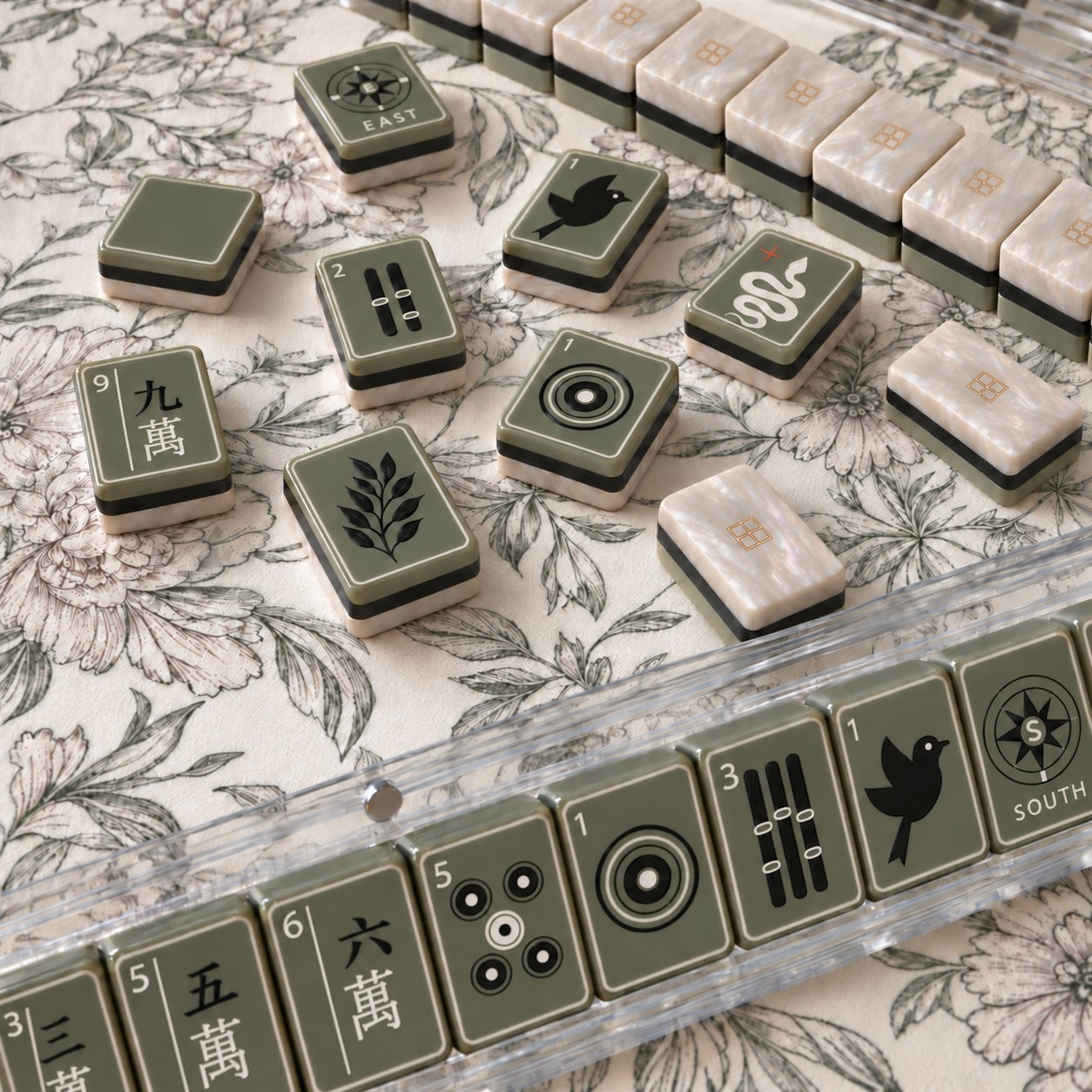 Olive pearl American Mahjong tiles arranged on a game table